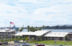 Entrance to the Pearl Harbor National Monument's Visitor Center. The Battleship Missouri & USS Arizona Memorial are in the background. 