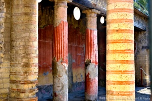 An example of Roman ingenuity is in using brick for most of a buildings construction, then a facade  of marble or limestone is applied, followed by vibrant color applications.